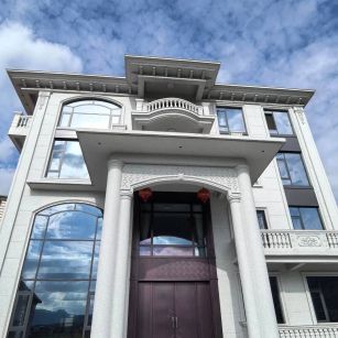 通辽白麻别墅外墙干挂石材效果示例