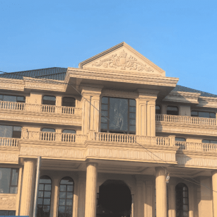 通辽黄金麻别墅外墙干挂石材效果示例