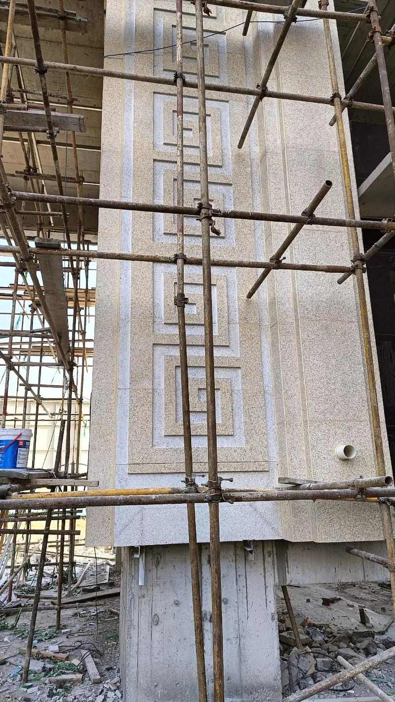 通辽 黄金麻花岗岩别墅外墙干挂回纹造型效果