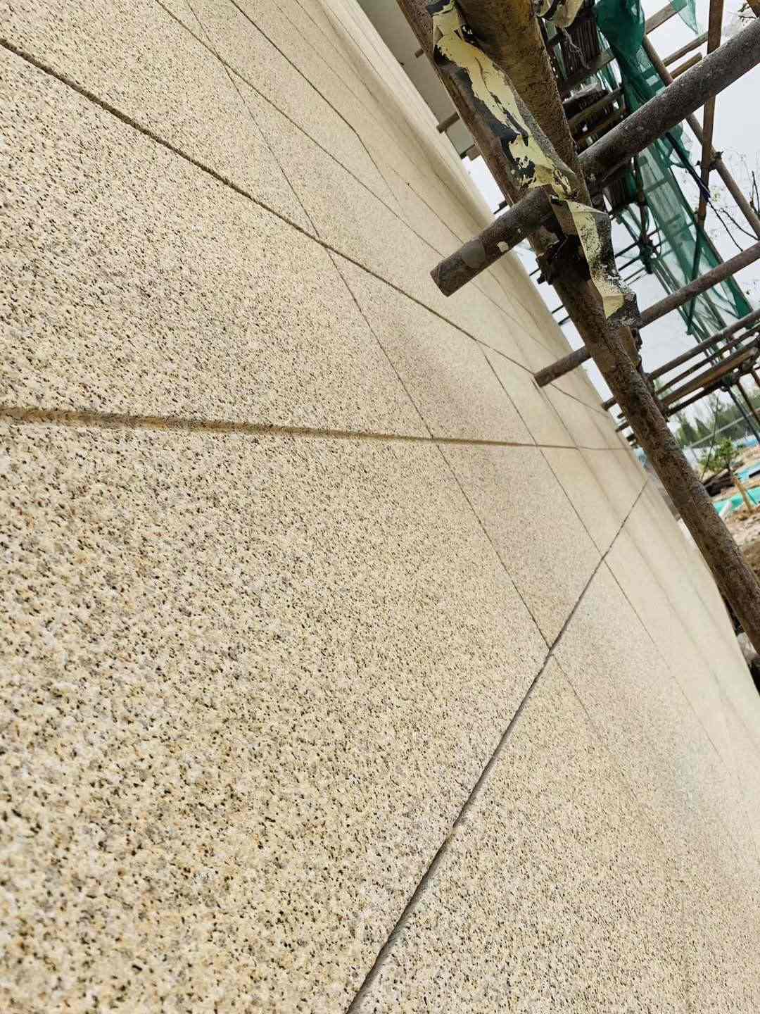 通辽 黄金麻花岗岩荔枝面外墙干挂石材效果示例